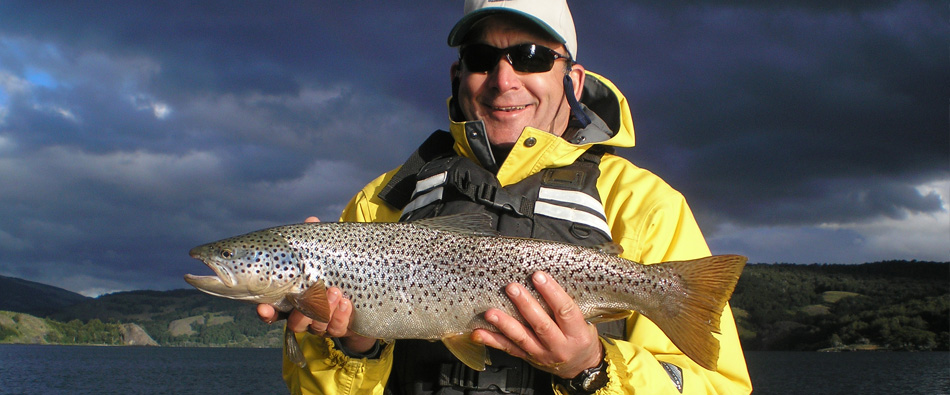 hook German brown and Rainbow trout in Patagonia, Chile with Jose Marti